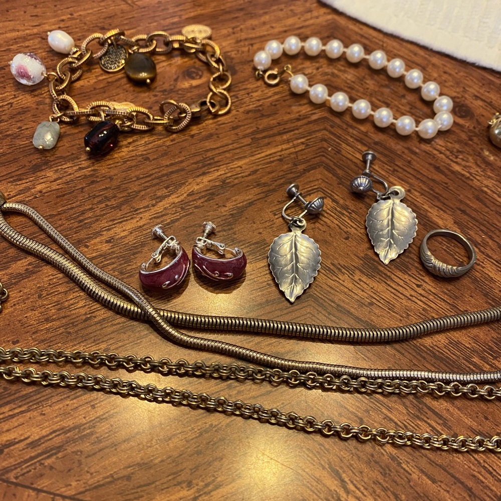2 necklaces 2 bracelets a ring unsure of size 2 pair clip earrings